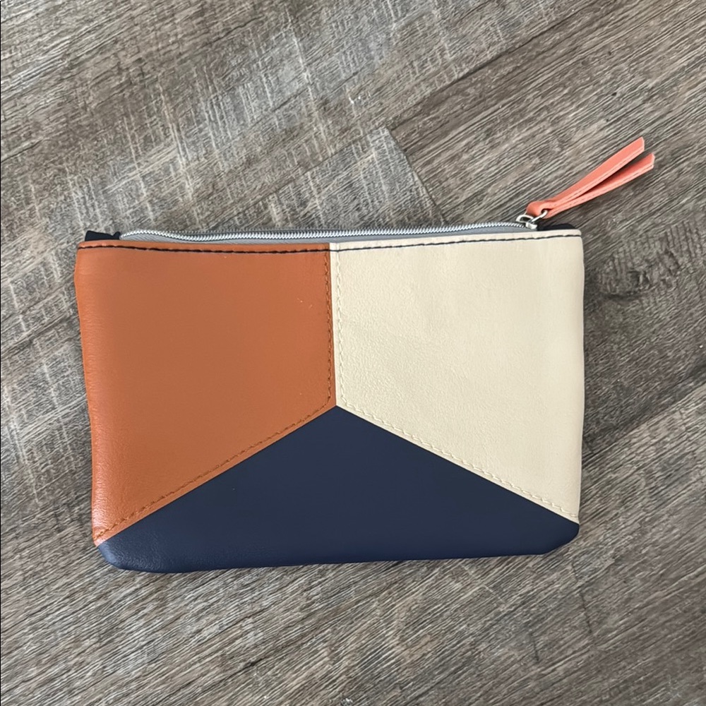 Ipsy Orange, Navy Blue, and Cream Cosmetic Bag with Modern Design